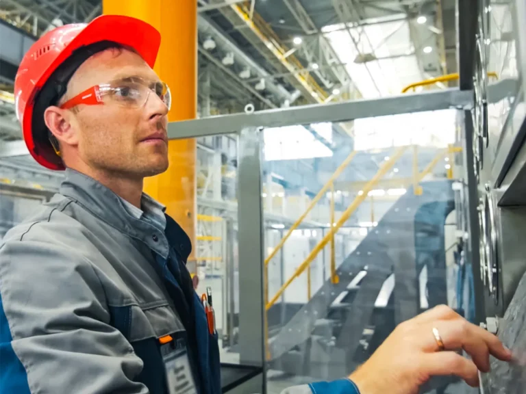 Fischer Process Industries industrial equipment technician in a manufacturing facility